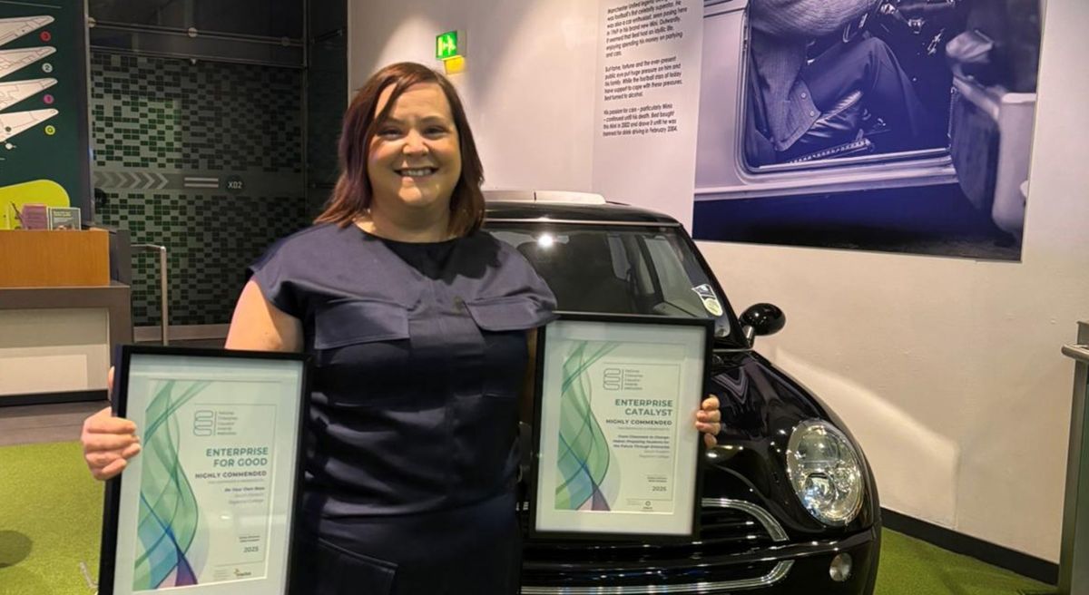 Picture of Catherine Shipman with two awards